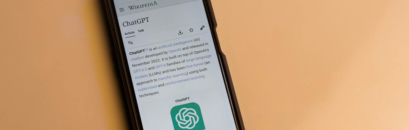 webpage of chatgpt a prototype ai chatbot is seen on the website of openai on a smartphone examples capabilities and limitations are shown