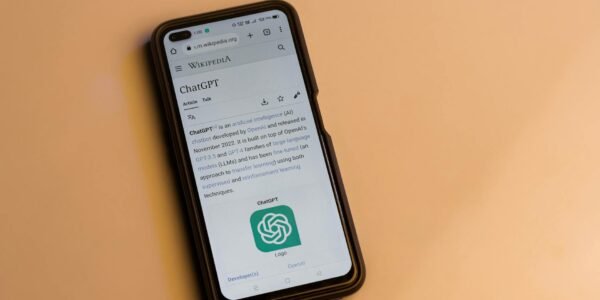 webpage of chatgpt a prototype ai chatbot is seen on the website of openai on a smartphone examples capabilities and limitations are shown