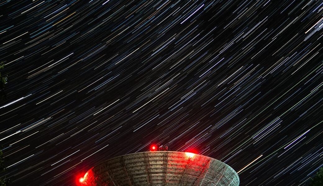 satellite dish under the night sky