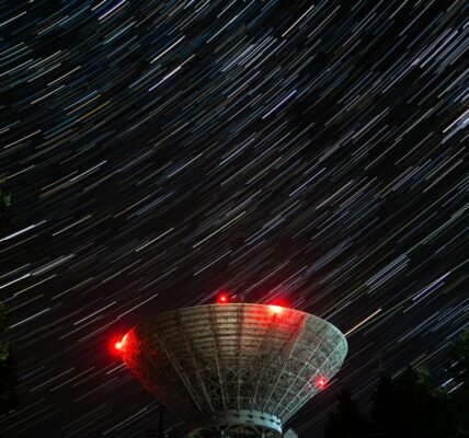 satellite dish under the night sky