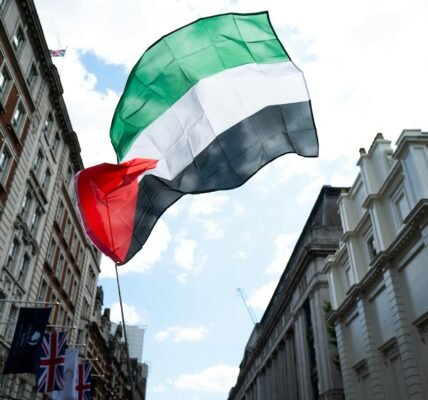 protest in london with palestinian flag