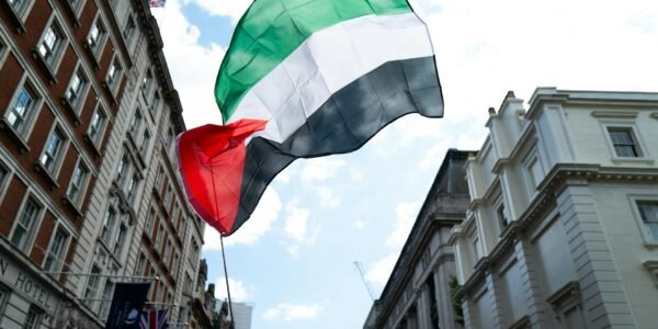 protest in london with palestinian flag
