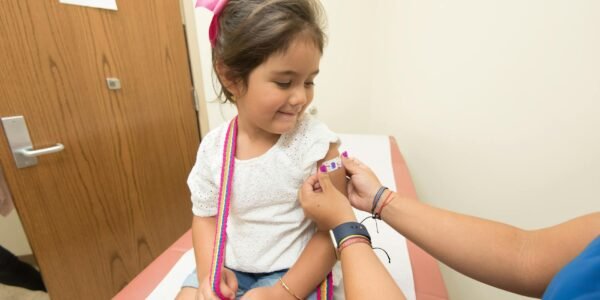 girl getting vaccinated