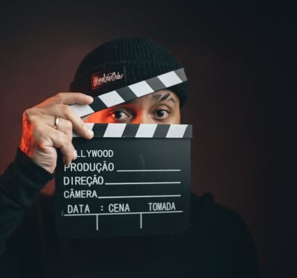 portrait of man with clapperboard