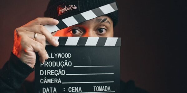 portrait of man with clapperboard