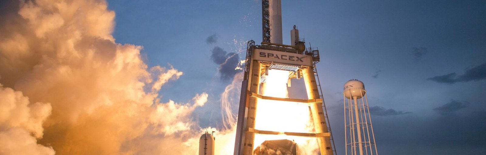 photo of gray and white spacex space shuttle