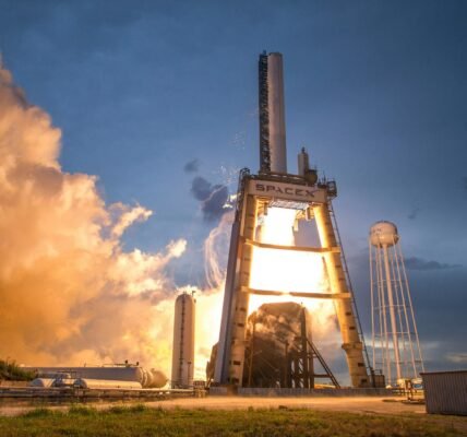 photo of gray and white spacex space shuttle