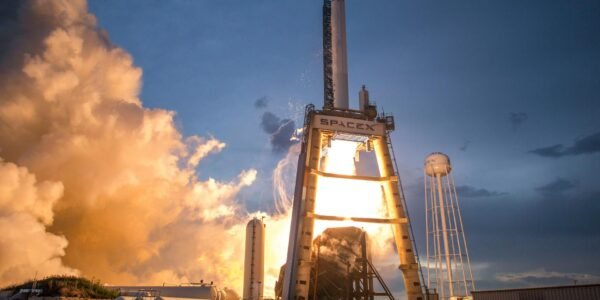photo of gray and white spacex space shuttle