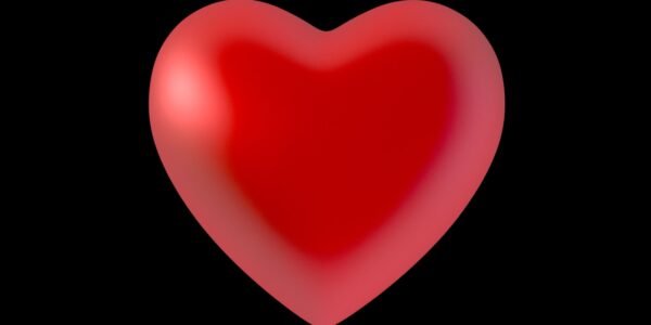 A red heart on a black background