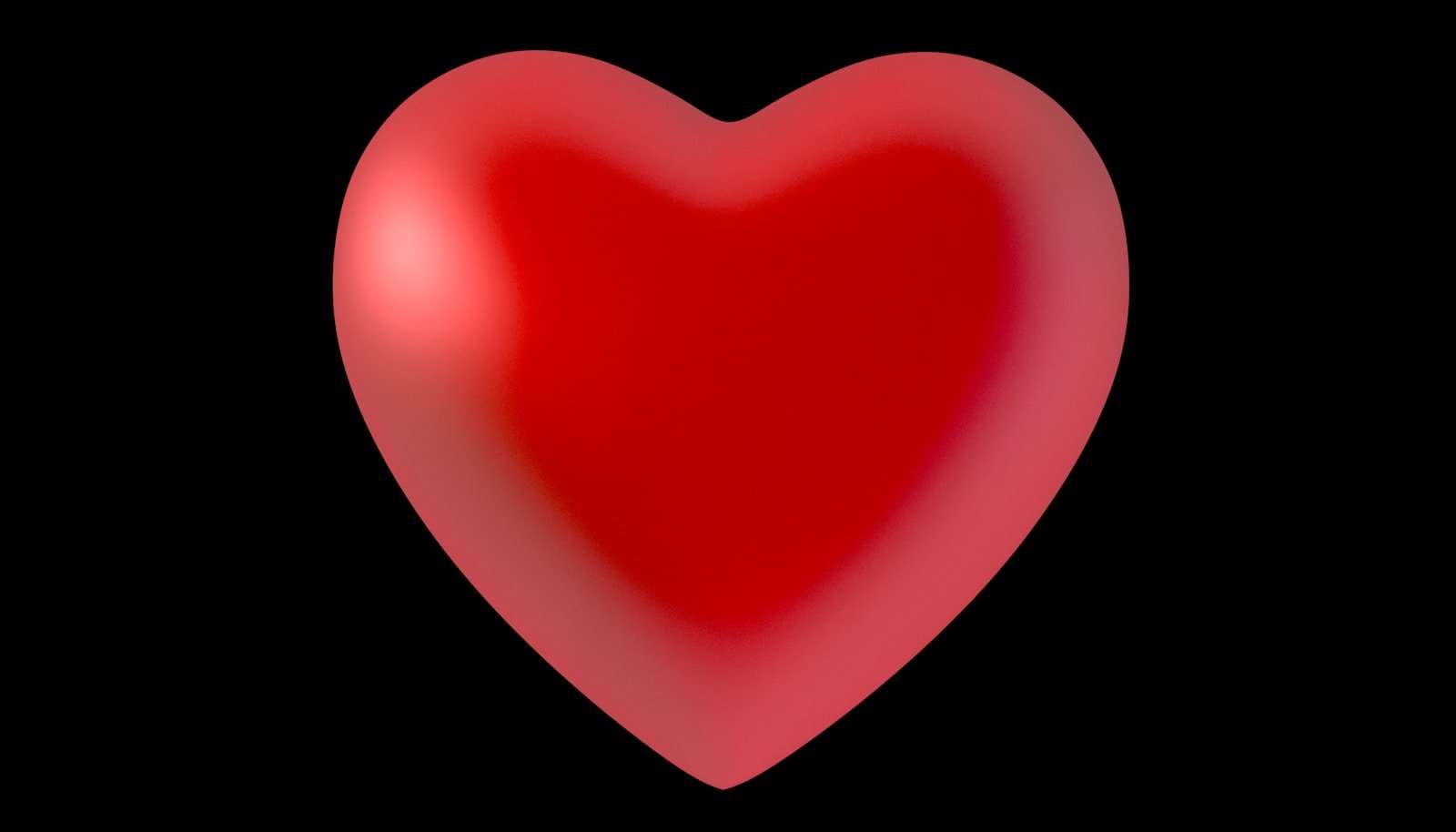 A red heart on a black background