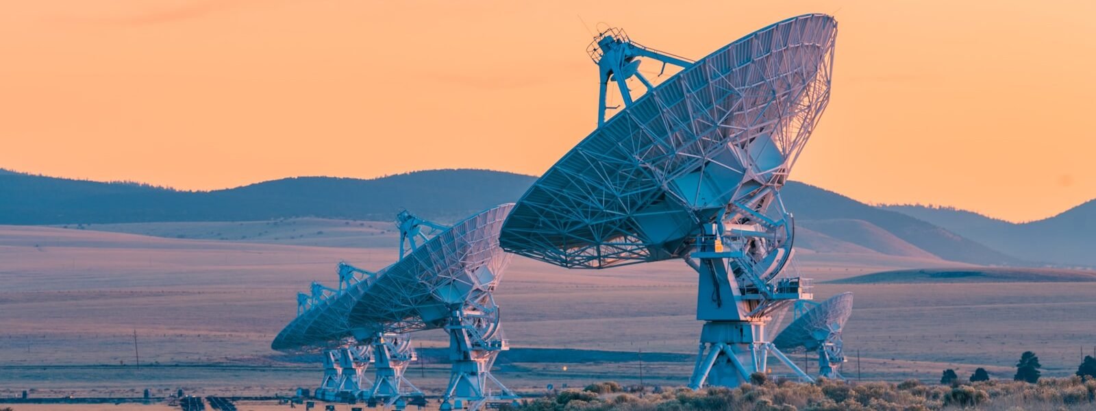 a group of satellite dishes