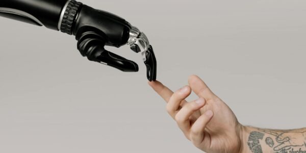 bionic hand and human hand finger pointing